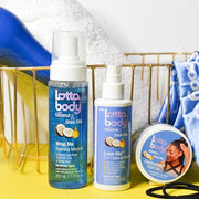 Lottabody Coconut & Shea Wrap Me Foaming Mousse, 7 oz | Foaming mousse that defines curls, controls frizz & adds lightweight, natural-looking shine & hold. Fast-drying & non-sticky.